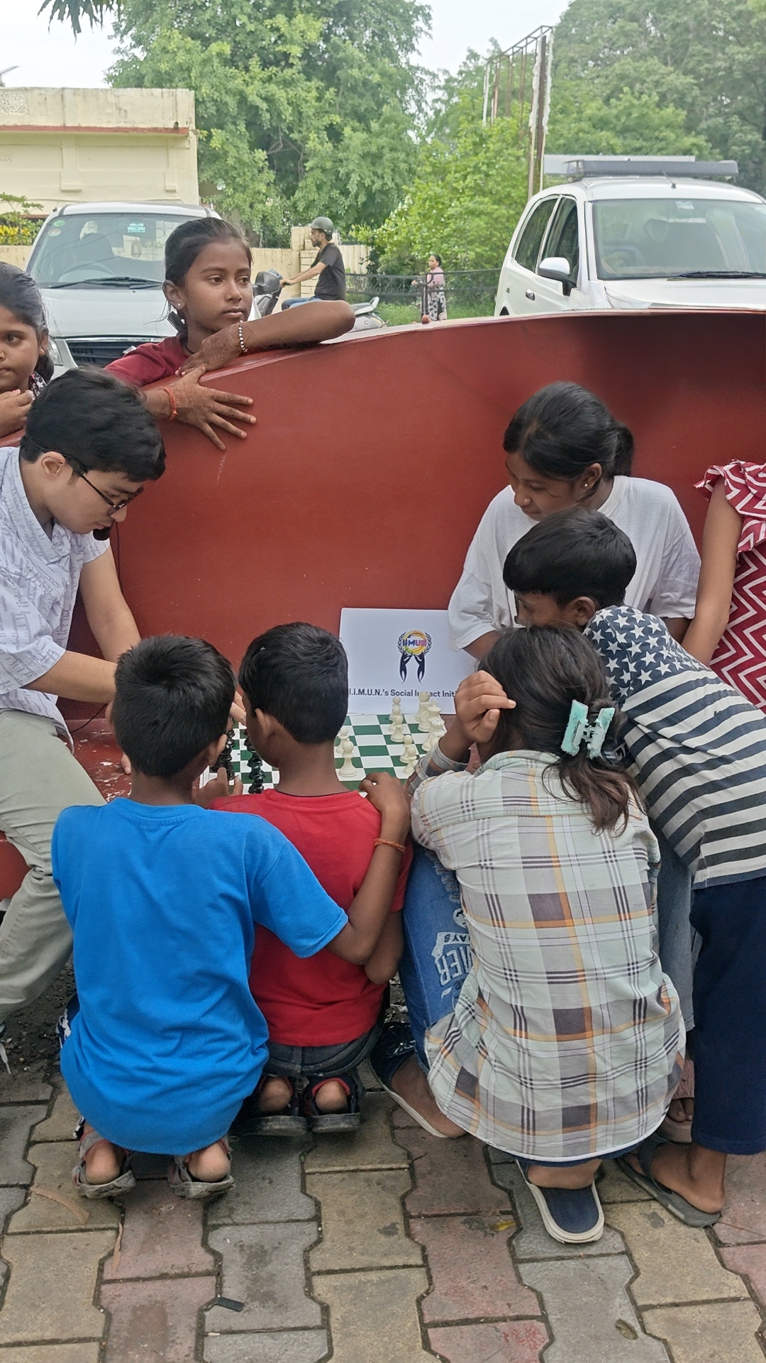 Children trying out their new notebooks and pencils